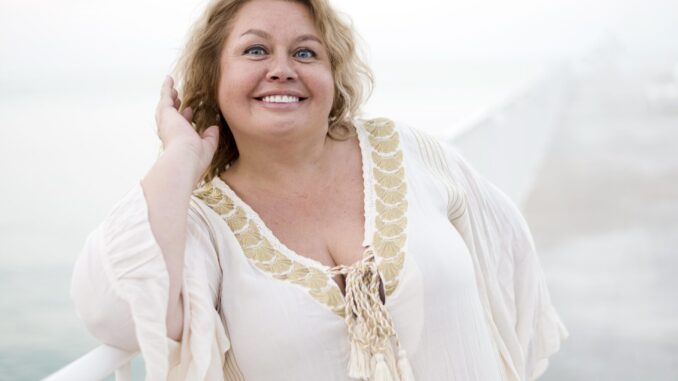 plus-size-model-smiling-camera