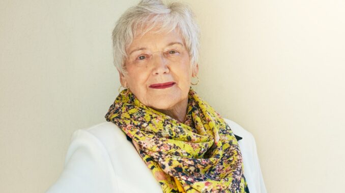 portrait-senior-woman-formal-wall-with-confidence-style-fashion-success-elderly-person-classy-cosmetics-with-accessories-winter-wear-warmth-retirement-outdoors