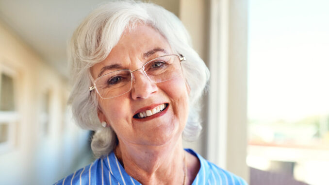 glasses-excited-portrait-senior-woman-home-with-positive-attitude-retirement-smile-memory-elderly-female-person-from-ireland-with-happiness-pension-fund-payout-with-finance